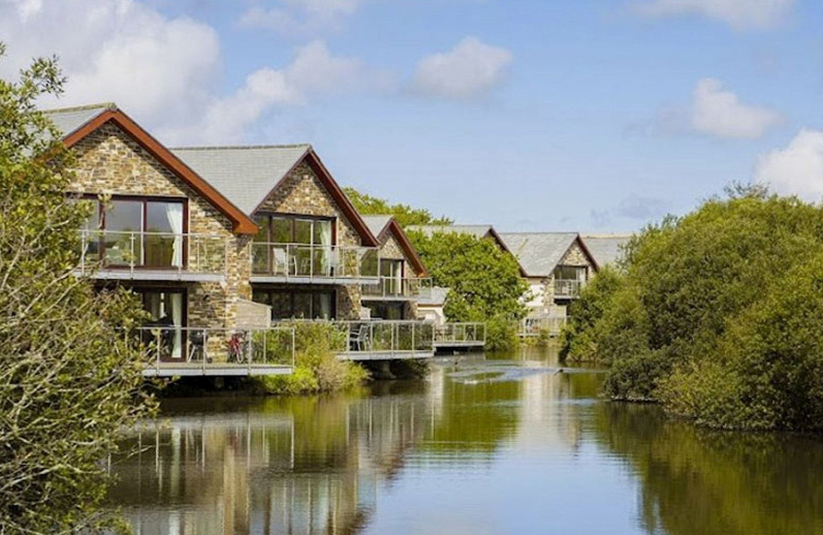 Retallack Resort near Padstow, barn-style lodges set around a lake in the north Cornwall countryside.