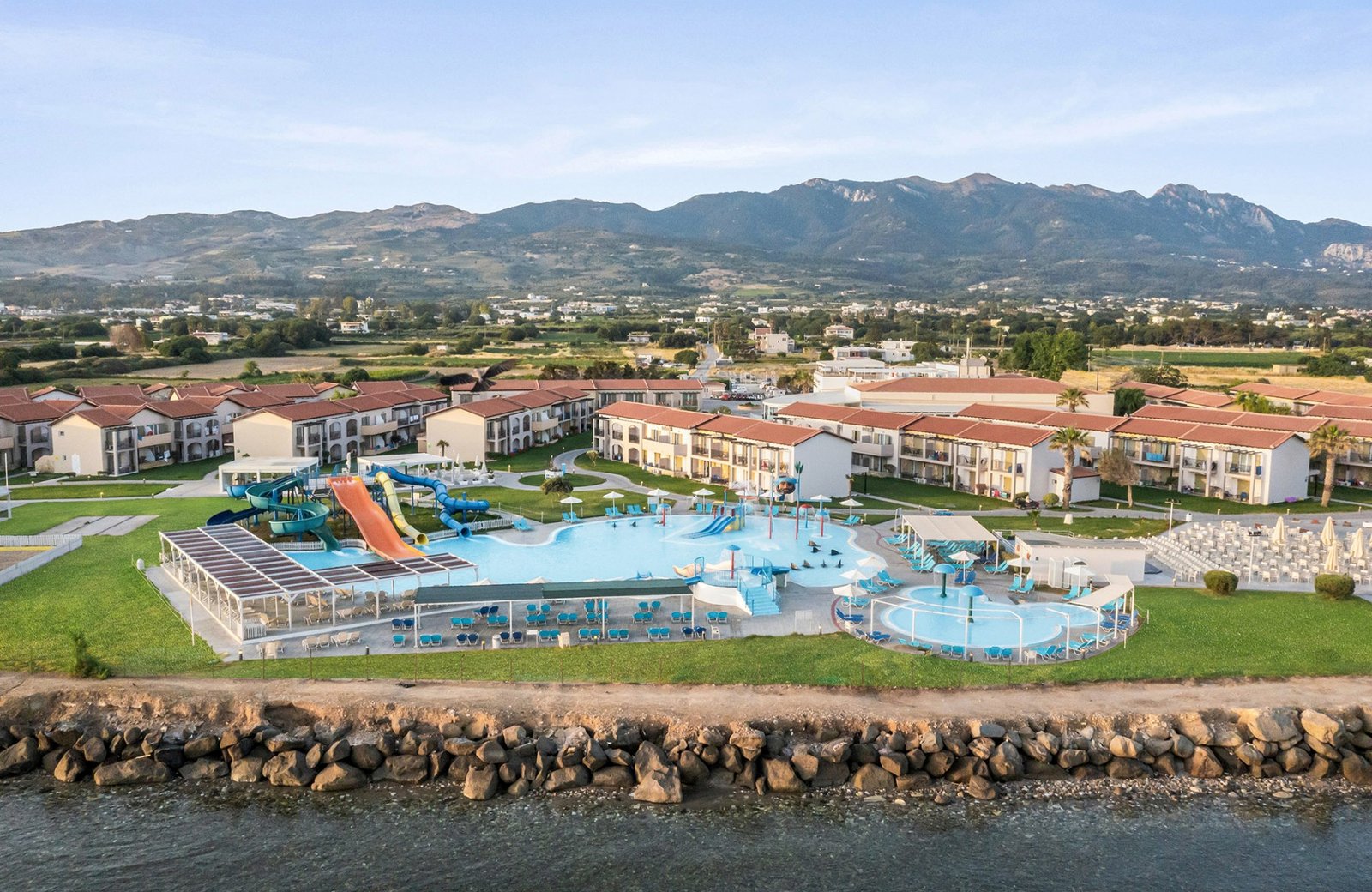 White Olive Marine Aquapark at Tigaki on Kos: low-rise buildings and the pools and aquapark set towards the sea.