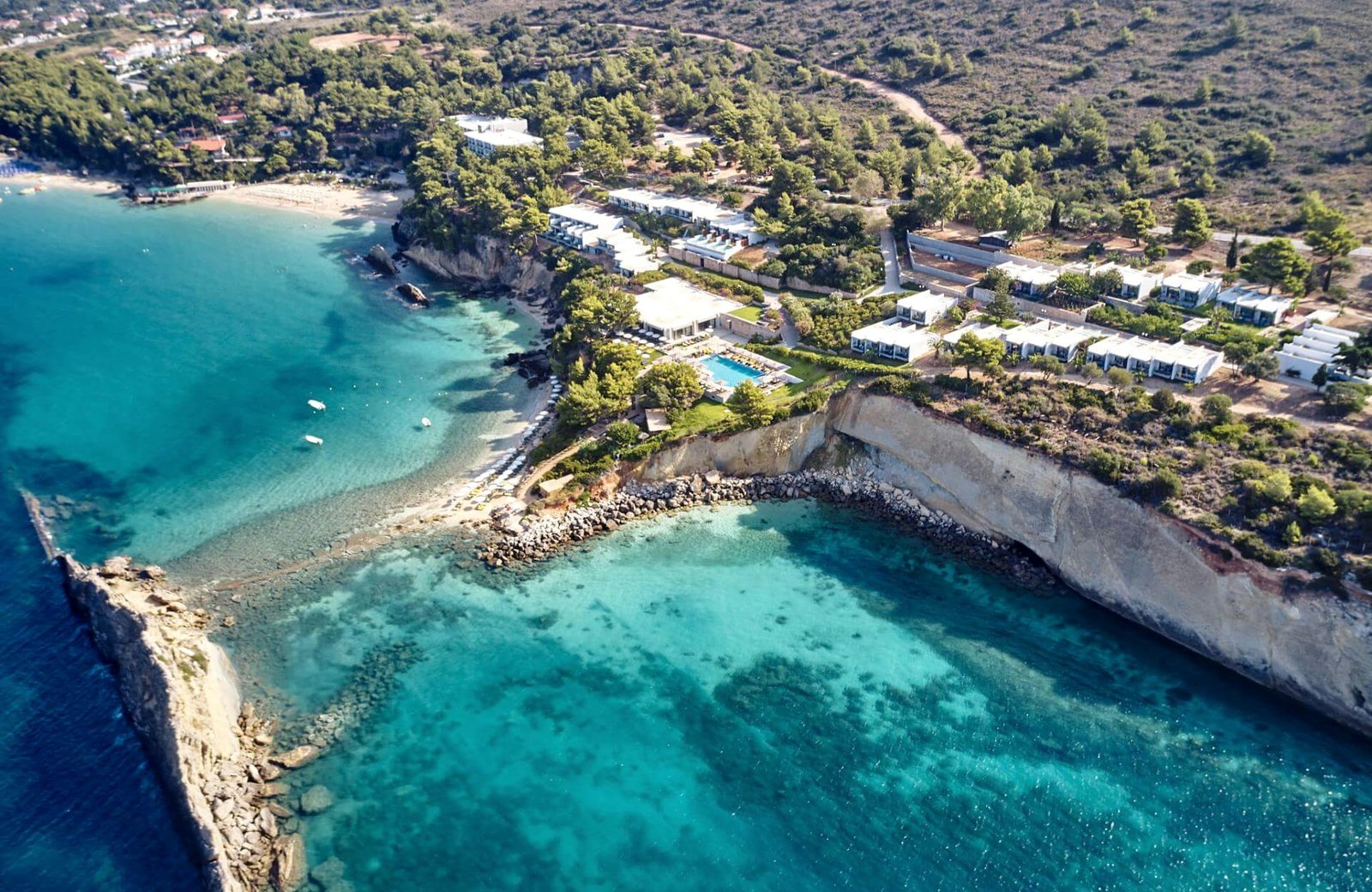 White Rocks Hotel on a pine-clad clifftop above Platis Gialos beach on the Lassi peninsula of Kefalonia.